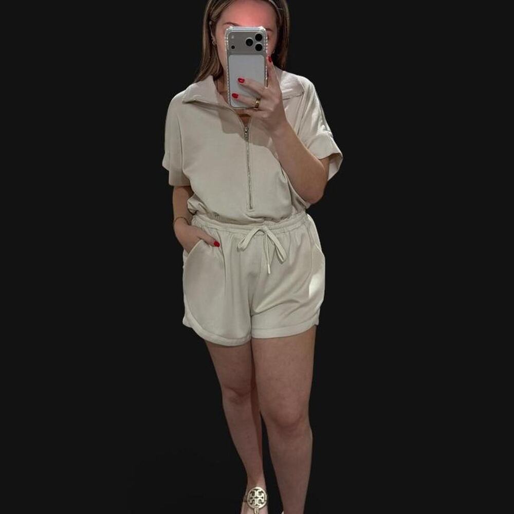 Boutique cream zip up romper